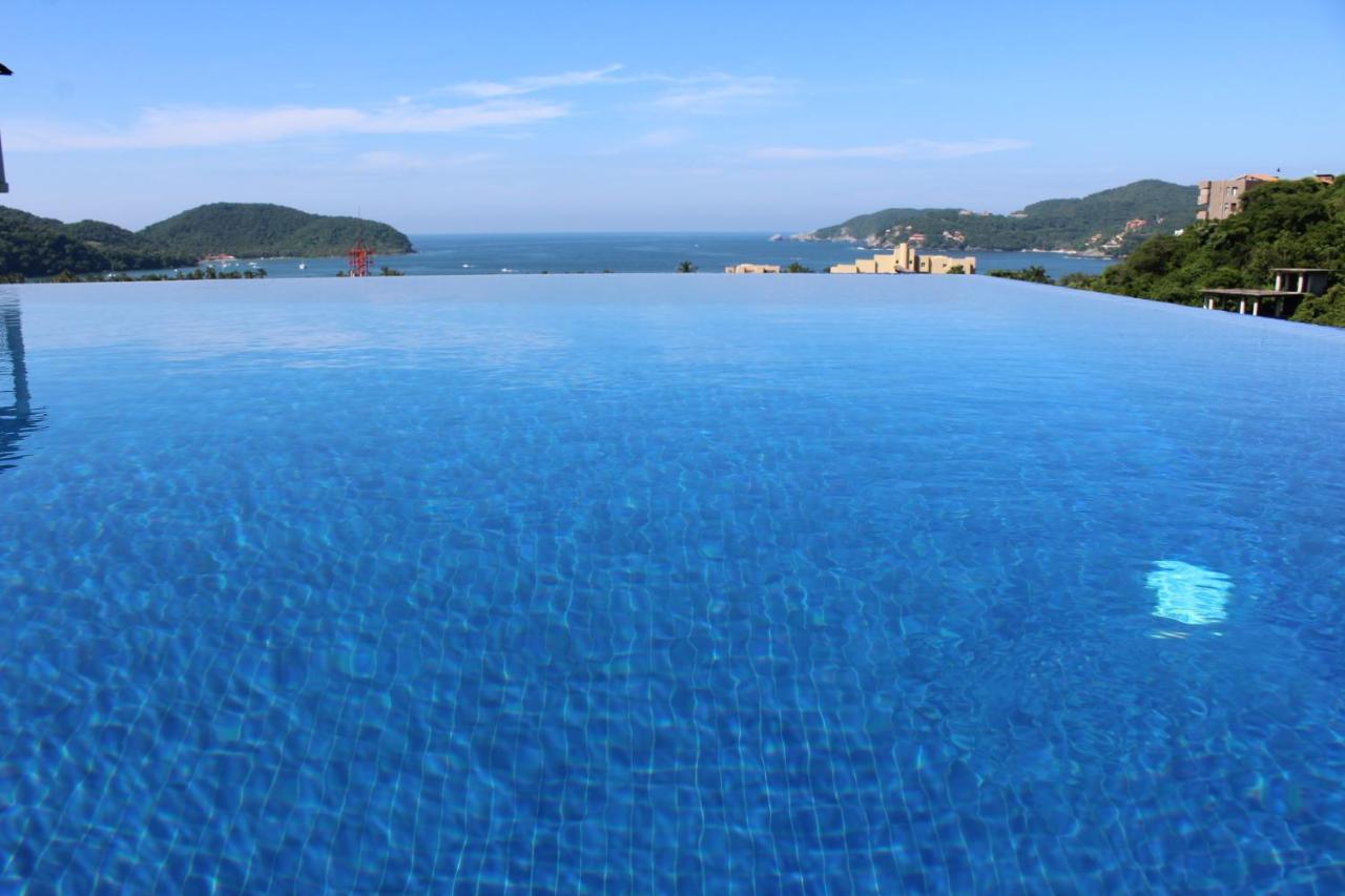 Aparthotel Sunset House Zihuatanejo Esterno foto