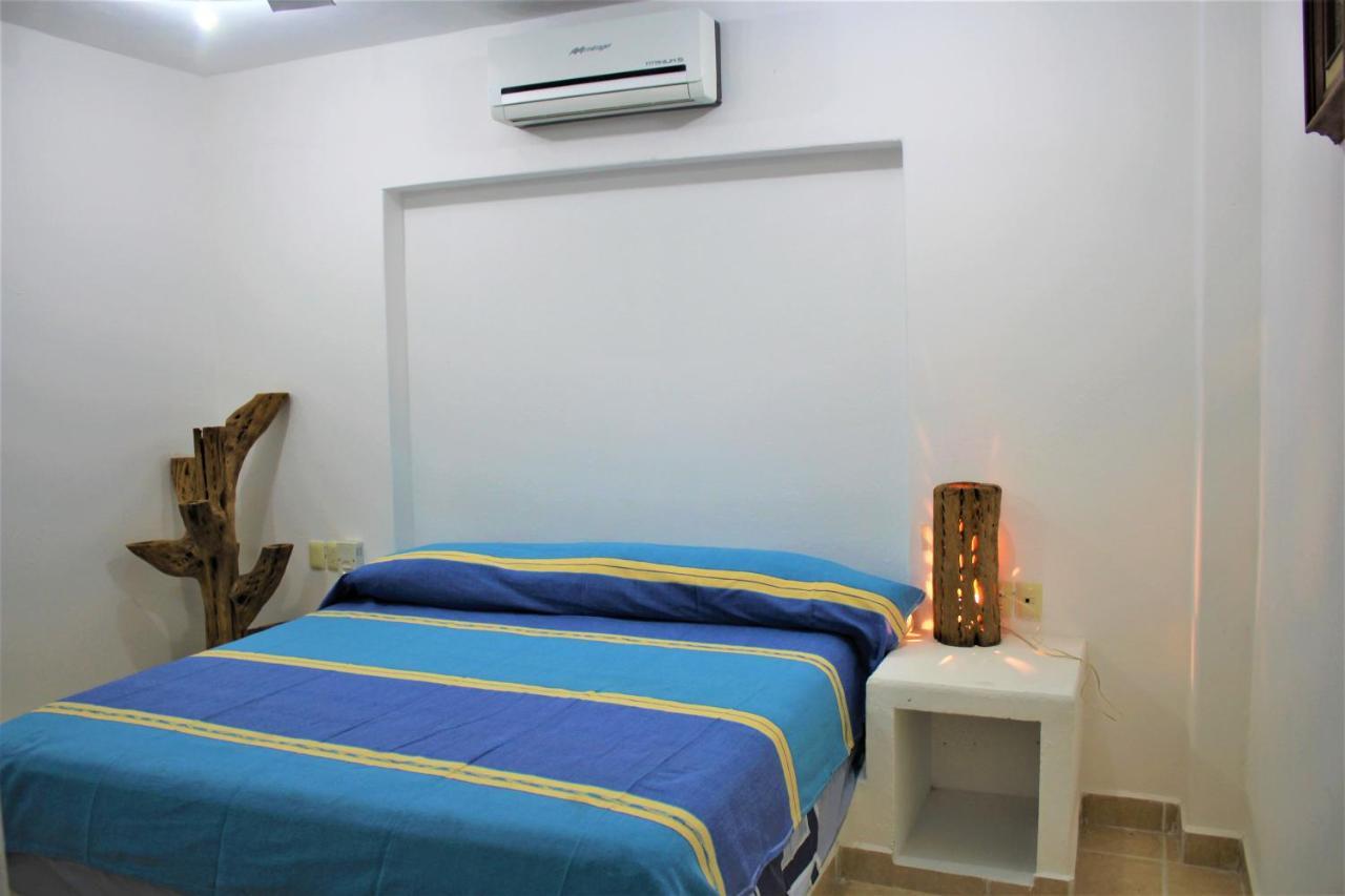 Aparthotel Sunset House Zihuatanejo Esterno foto